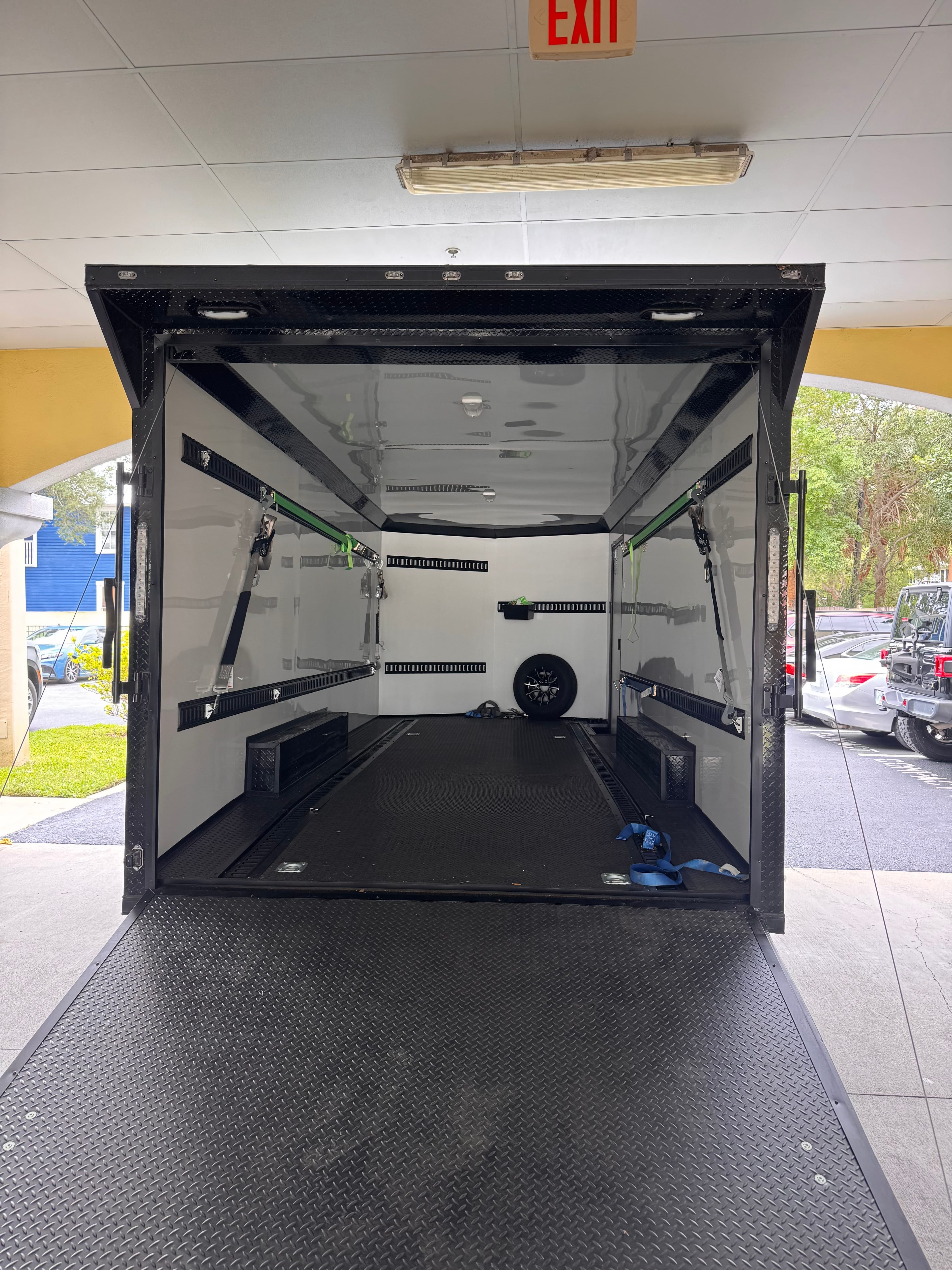 Enclosed trailer interior with d-ring tie-downs - spacious cargo area rental